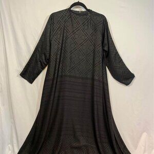 Woman’s high neck flowy black abaya dress. Unique pattern. Unique zipper design.